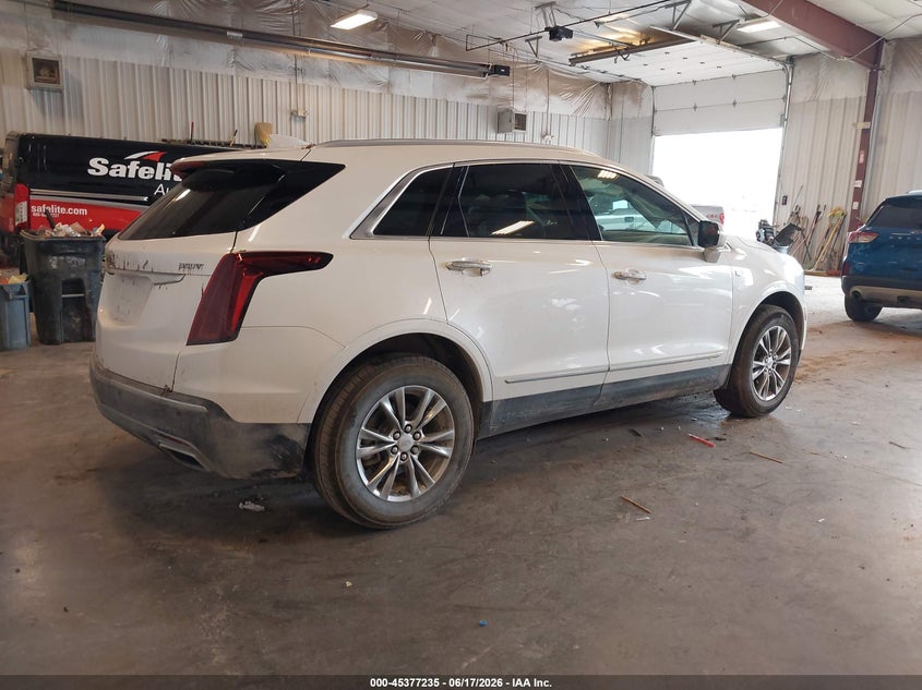 2023 Cadillac Xt5 VIN 1GYKNDR4XPZ191983 IAAI salvage auction — LEFT SIDE, Clear (Michigan), sold $6,600 on 2026-07-29 (photo 4)