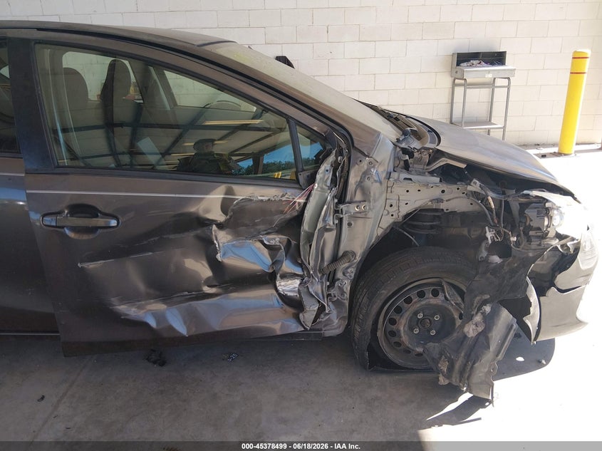 2012 Toyota Prius c VIN JTDKDTB31C1022982 IAAI salvage auction — RIGHT FRONT, Bill Of Sale (Washington), sold $825 on 2026-07-16 (photo 6)