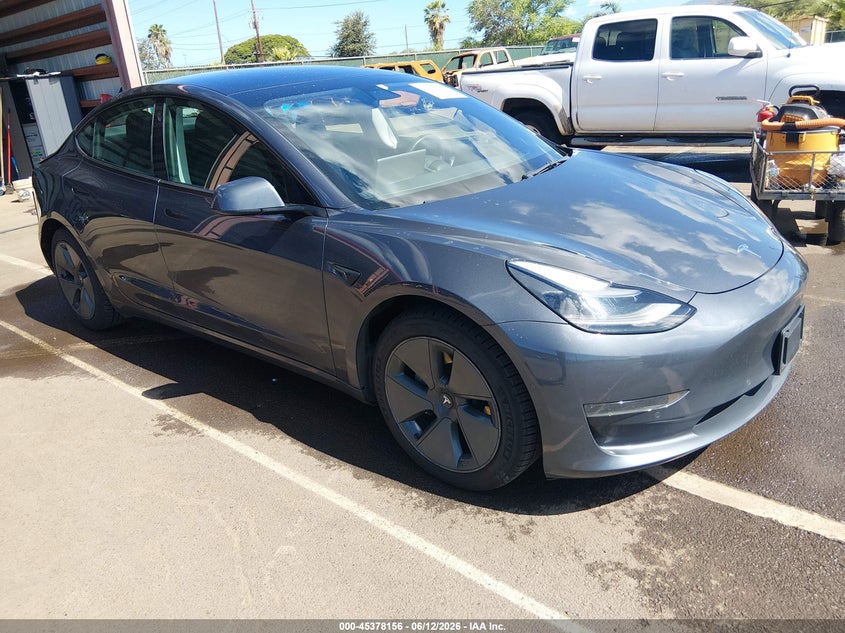 2022 Tesla Model 3 VIN 5YJ3E1EA7NF122076 — IAAI salvage auction photo