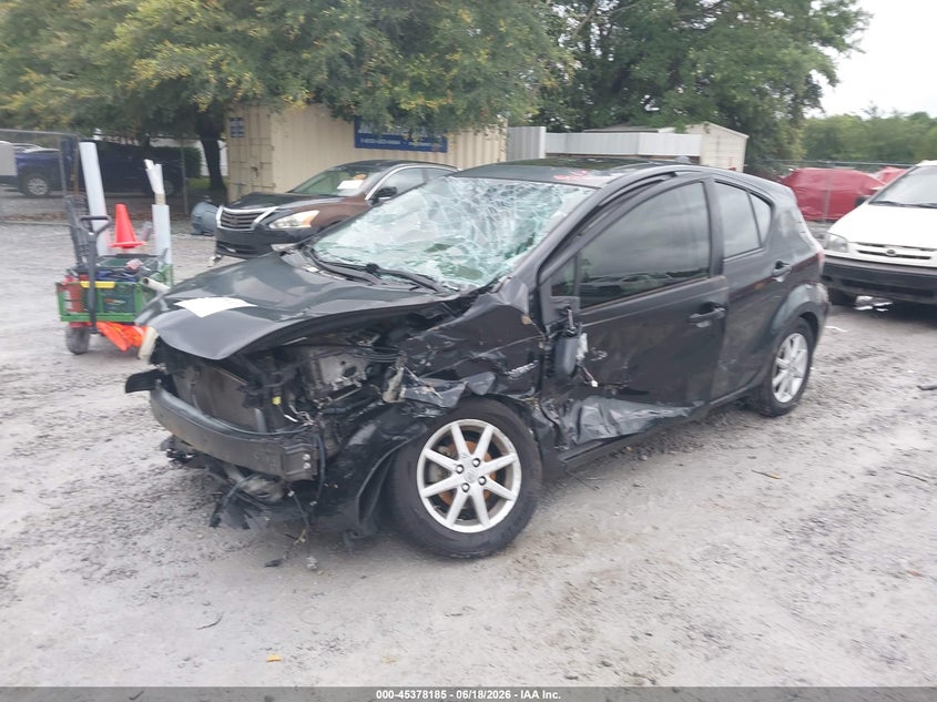 2016 Toyota Prius c VIN JTDKDTB38G1129825 IAAI salvage auction — LEFT FRONT, Salvage Title, sold $1,100 on 2026-07-30 (photo 2)