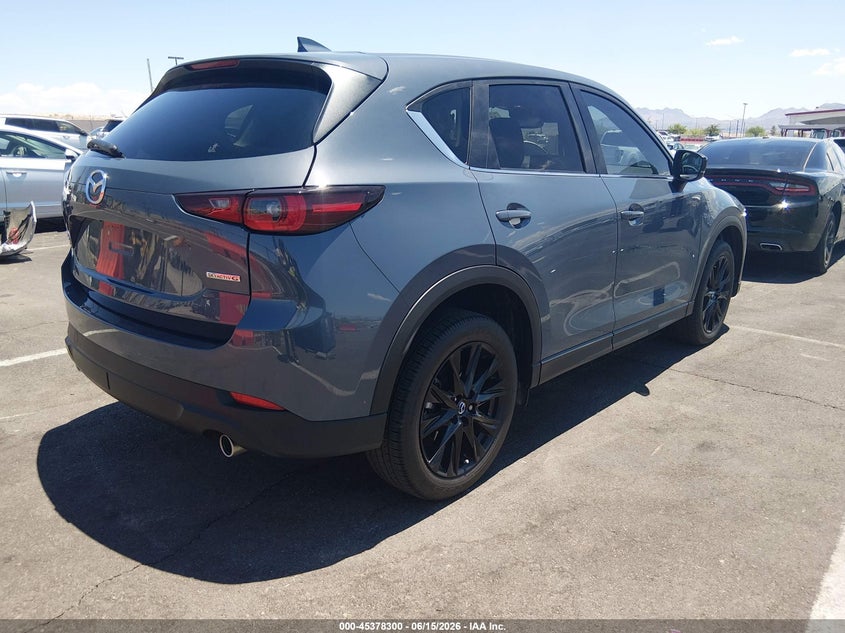 2025 Mazda Cx-5 VIN JM3KFBCM1S0569242 IAAI salvage auction — SIDE, Salvage Title, sold $8,400 on 2026-08-02 (photo 4)