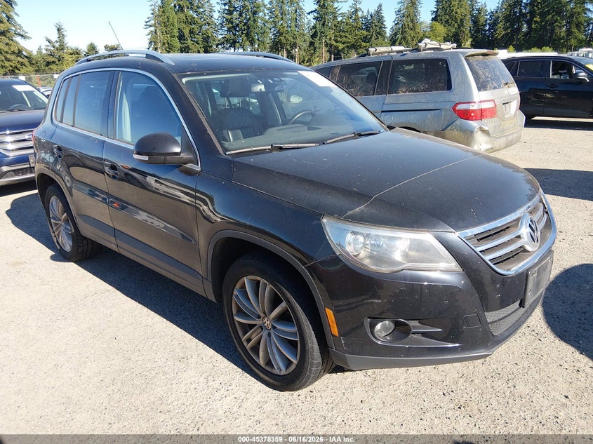 2011 Volkswagen Tiguan VIN WVGBV7AX9BW567625 IAAI salvage auction — NORMAL WEAR, Clear (Washington), sold $375 on 2026-07-22 (photo 1)