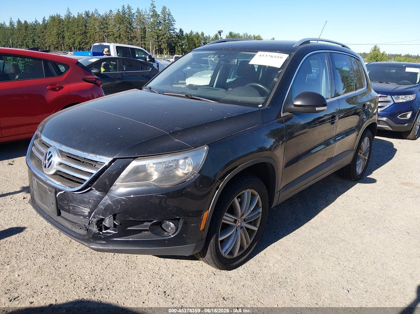 2011 Volkswagen Tiguan VIN WVGBV7AX9BW567625 IAAI salvage auction — NORMAL WEAR, Clear (Washington), sold $375 on 2026-07-22 (photo 2)