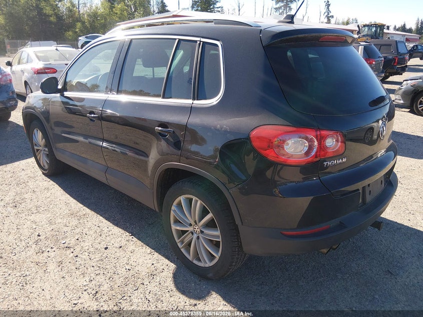 2011 Volkswagen Tiguan VIN WVGBV7AX9BW567625 IAAI salvage auction — NORMAL WEAR, Clear (Washington), sold $375 on 2026-07-22 (photo 3)
