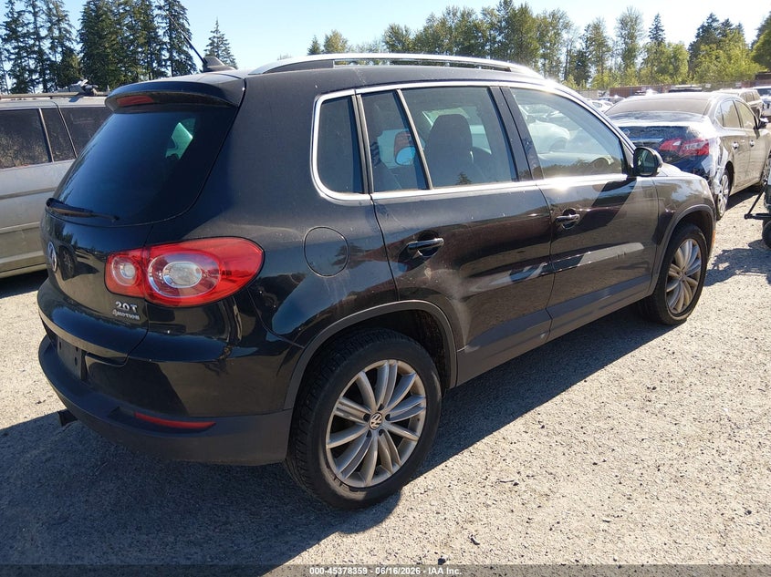 2011 Volkswagen Tiguan VIN WVGBV7AX9BW567625 IAAI salvage auction — NORMAL WEAR, Clear (Washington), sold $375 on 2026-07-22 (photo 4)