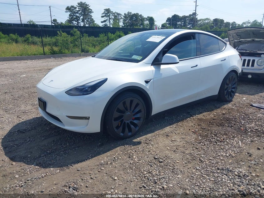 2025 Tesla Model y VIN 7SAYGDEF4SF298501 IAAI salvage auction — REAR END, Wait Title, sold $13,500 on 2026-08-02 (photo 2)