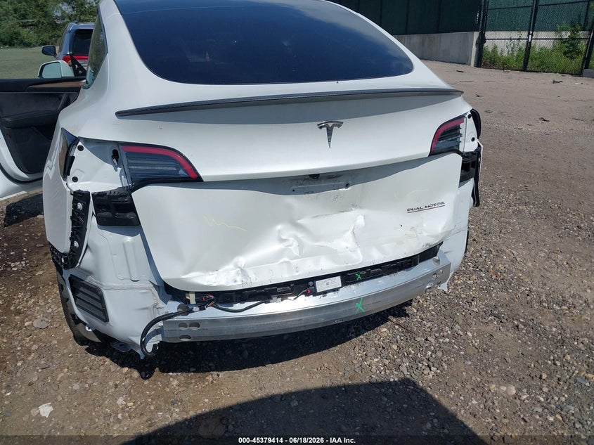 2025 Tesla Model y VIN 7SAYGDEF4SF298501 IAAI salvage auction — REAR END, Wait Title, sold $13,500 on 2026-08-02 (photo 6)