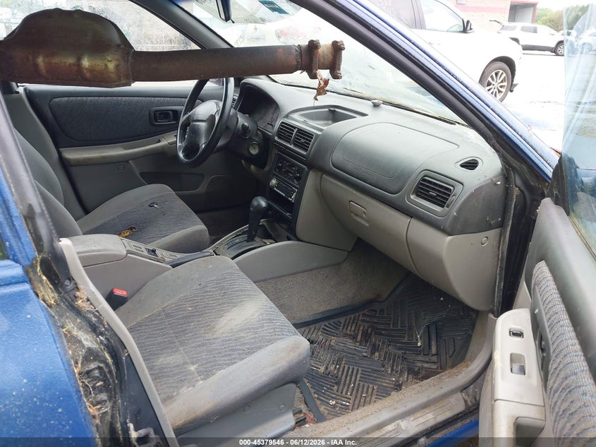 1999 Subaru Impreza VIN JF1GF4853XH803505 IAAI salvage auction — NORMAL WEAR, Original (Maine), sold $275 on 2026-07-20 (photo 5)
