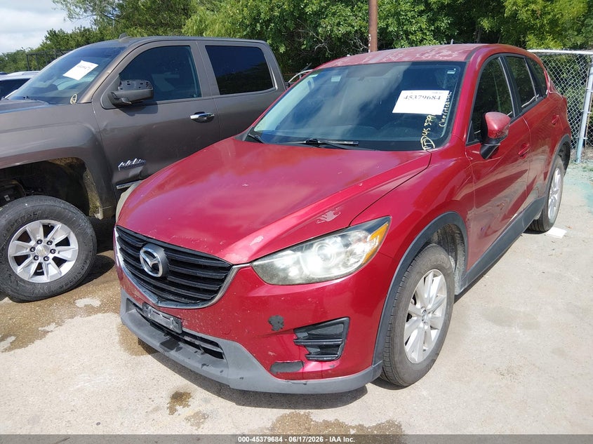 2016 Mazda Cx-5 VIN JM3KE2BY3G0645946 IAAI salvage auction — NORMAL WEAR, Clear (Florida), sold $2,300 on 2026-07-20 (photo 6)