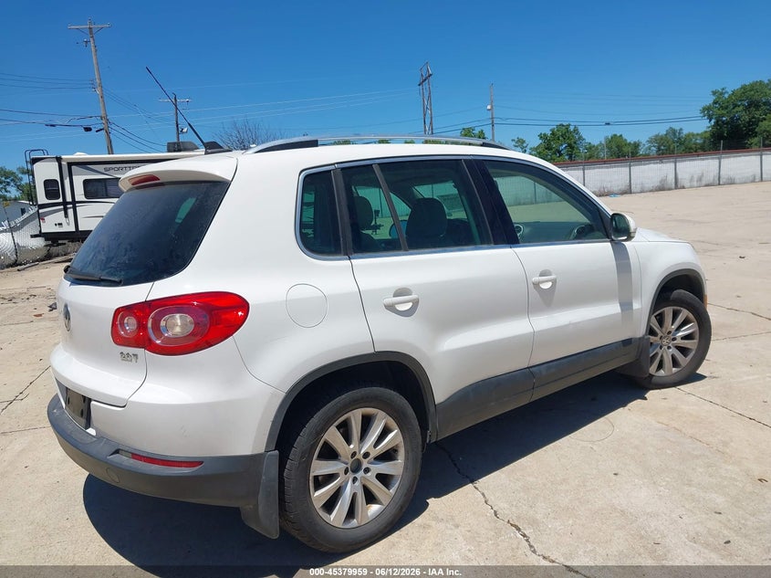 2009 Volkswagen Tiguan VIN WVGAV75N79W544472 IAAI salvage auction — NORMAL WEAR, Clear (Missouri), sold $400 on 2026-07-14 (photo 4)