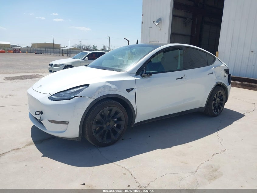2021 Tesla Model y VIN 5YJYGDEE4MF303722 IAAI salvage auction — SIDE, Clear (Montana), sold $11,850 on 2026-07-16 (photo 2)
