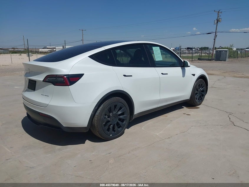 2021 Tesla Model y VIN 5YJYGDEE4MF303722 IAAI salvage auction — SIDE, Clear (Montana), sold $11,850 on 2026-07-16 (photo 4)