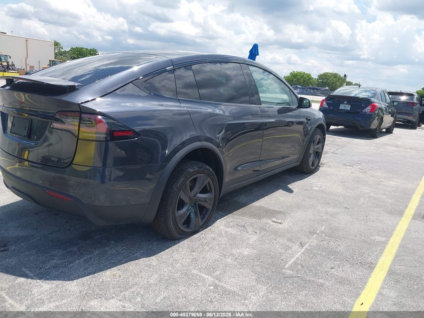2026 Tesla Model x VIN 7SAXCBE51TF473212 IAAI salvage auction — VANDALISM, Salvage Title, sold $38,250 on 2026-07-23 (photo 4)