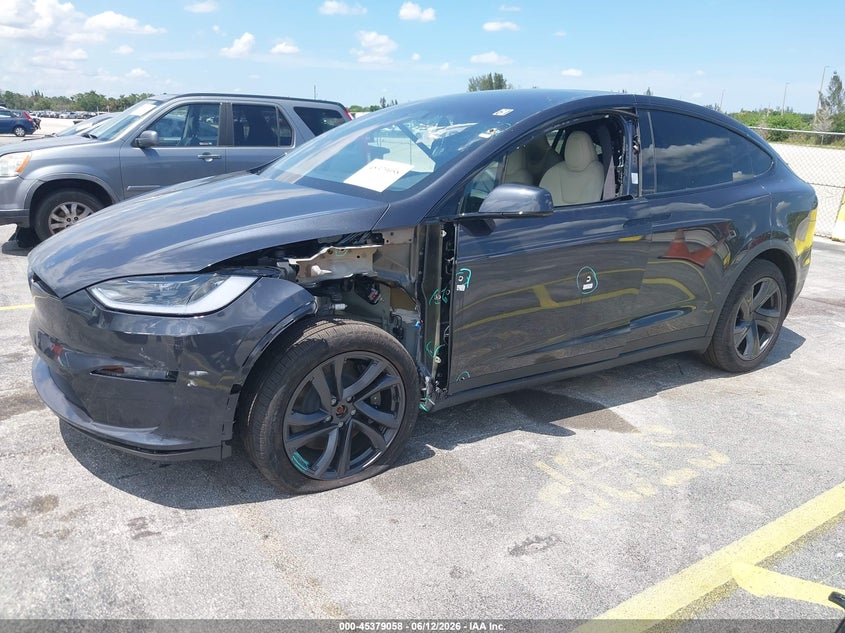 2026 Tesla Model x VIN 7SAXCBE51TF473212 IAAI salvage auction — VANDALISM, Salvage Title, sold $38,250 on 2026-07-23 (photo 6)