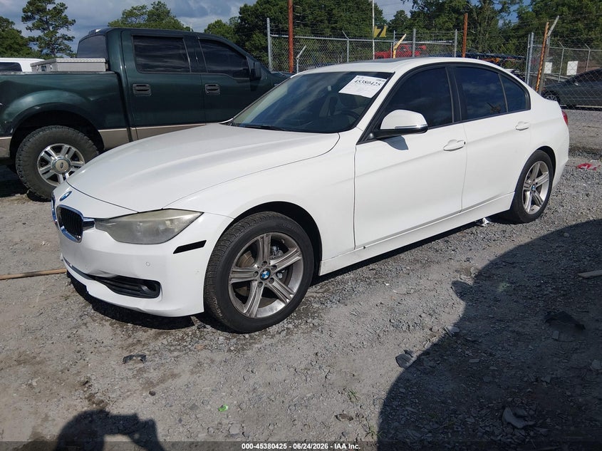 2015 BMW 3er VIN WBA3A5C51FF610877 IAAI salvage auction — LEFT SIDE, Salvage (Idaho), sold $1,900 on 2026-08-04 (photo 2)