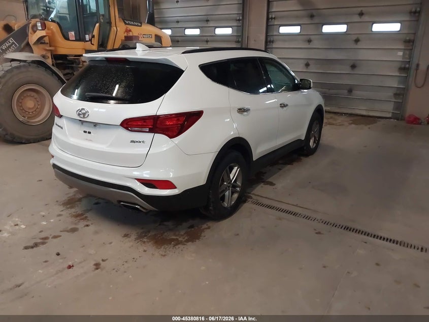 2018 Hyundai Santa fe VIN 5XYZU3LB2JG524904 IAAI salvage auction — HAIL, Clear (Wisconsin), sold $4,300 on 2026-07-23 (photo 4)