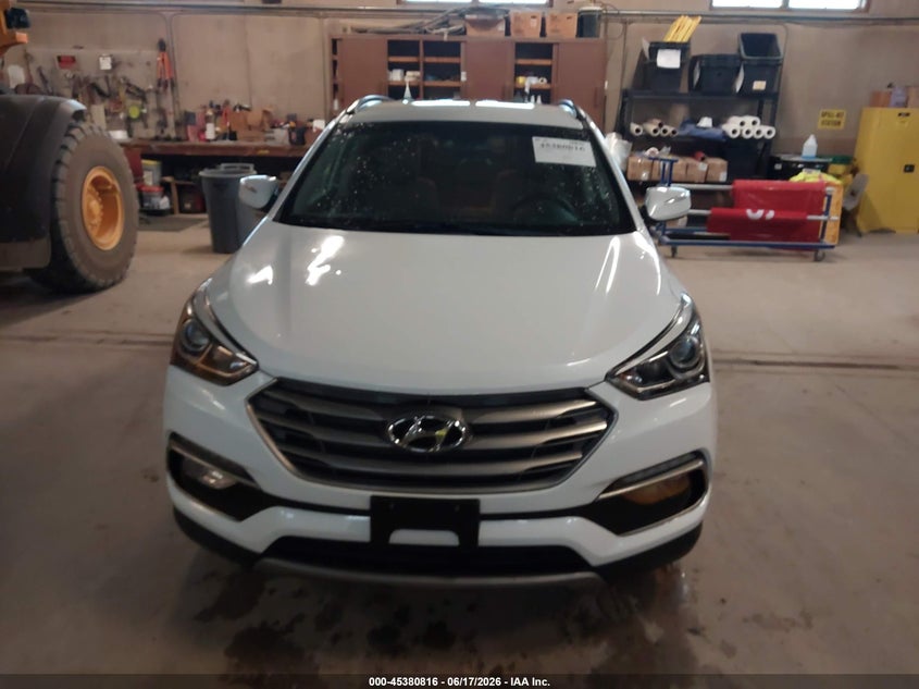 2018 Hyundai Santa fe VIN 5XYZU3LB2JG524904 IAAI salvage auction — HAIL, Clear (Wisconsin), sold $4,300 on 2026-07-23 (photo 6)