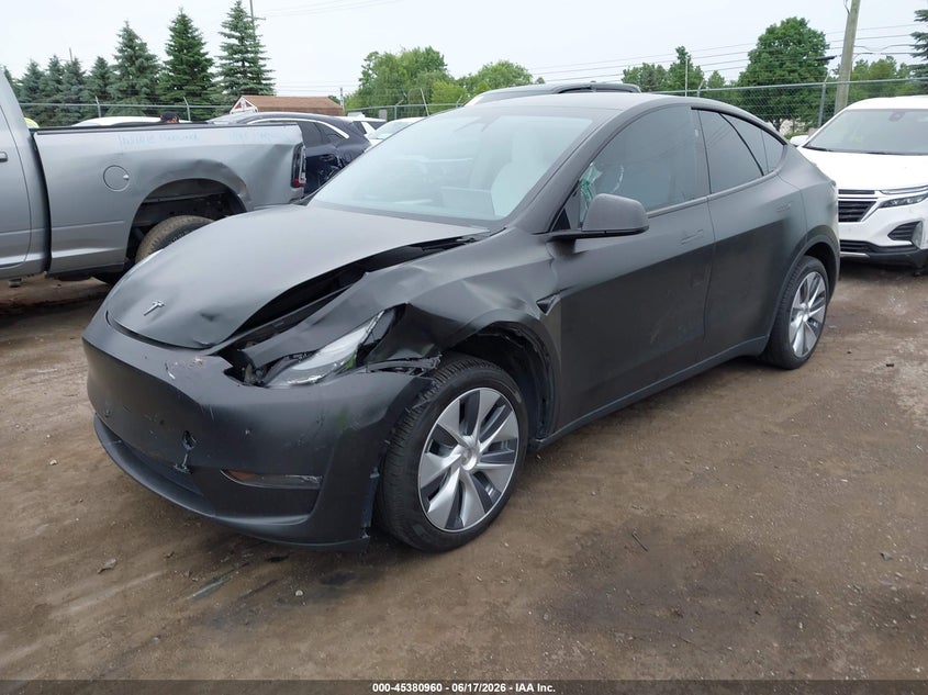 2023 Tesla Model y VIN 7SAYGDEE3PF868339 IAAI salvage auction — FRONT END, Clear (Michigan), sold $10,000 on 2026-07-12 (photo 2)