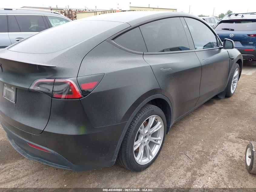 2023 Tesla Model y VIN 7SAYGDEE3PF868339 IAAI salvage auction — FRONT END, Clear (Michigan), sold $10,000 on 2026-07-12 (photo 4)