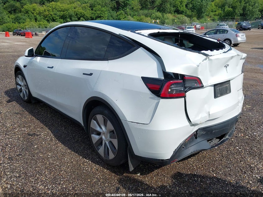 2023 Tesla Model y VIN 7SAYGAEE5PF895170 IAAI salvage auction — REAR END, Salvage Title, sold $8,600 on 2026-08-02 (photo 3)