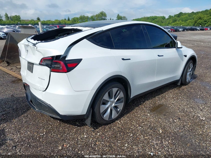 2023 Tesla Model y VIN 7SAYGAEE5PF895170 IAAI salvage auction — REAR END, Salvage Title, sold $8,600 on 2026-08-02 (photo 4)
