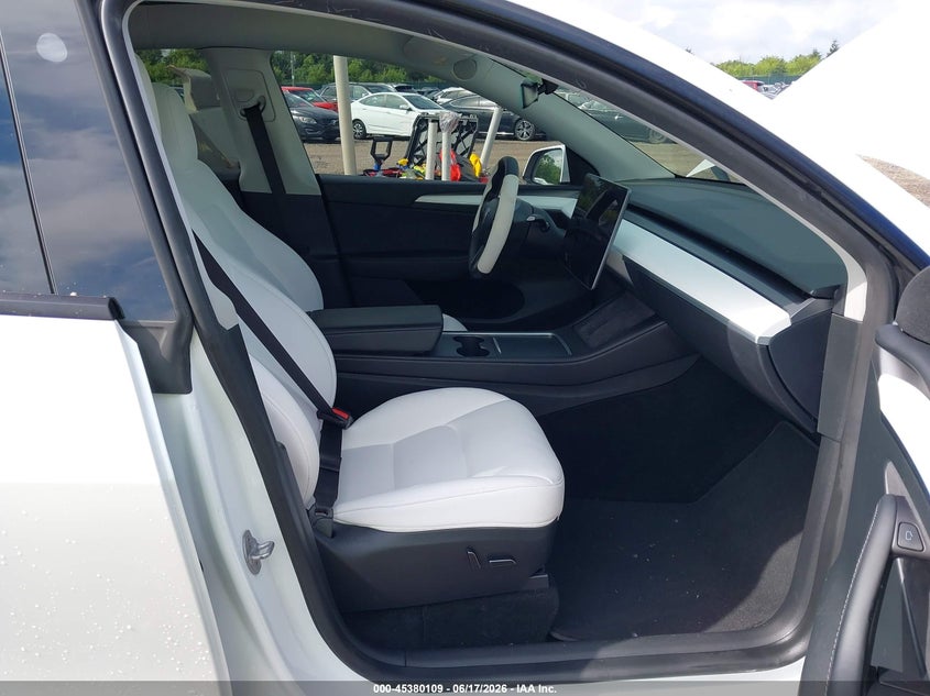 2023 Tesla Model y VIN 7SAYGAEE5PF895170 IAAI salvage auction — REAR END, Salvage Title, sold $8,600 on 2026-08-02 (photo 5)