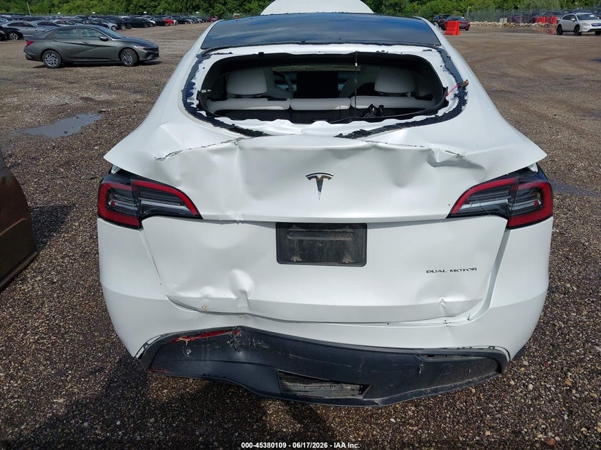 2023 Tesla Model y VIN 7SAYGAEE5PF895170 IAAI salvage auction — REAR END, Salvage Title, sold $8,600 on 2026-08-02 (photo 6)