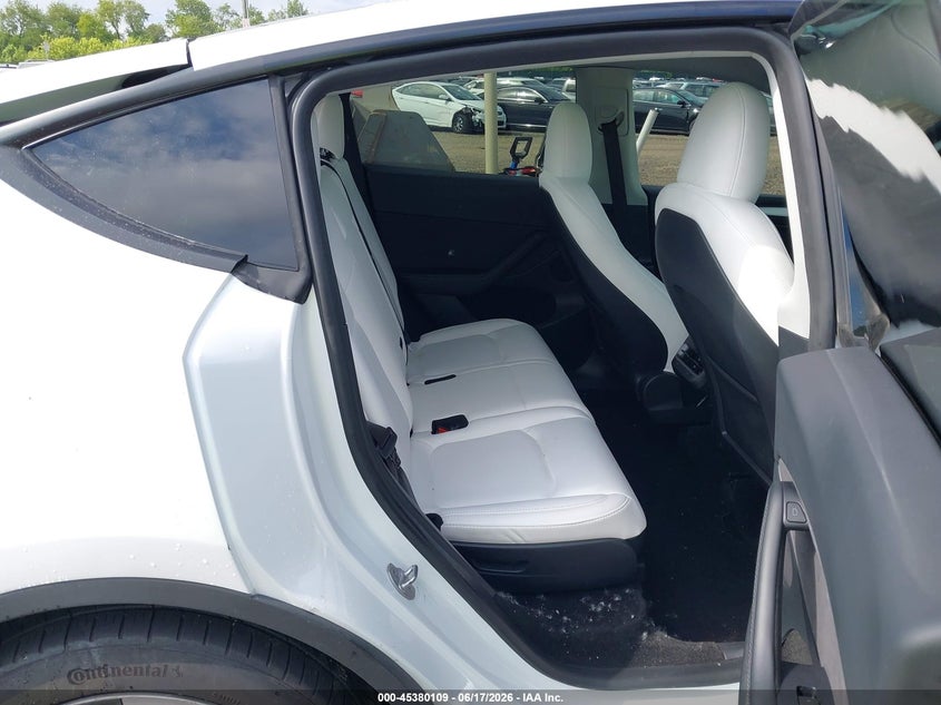 2023 Tesla Model y VIN 7SAYGAEE5PF895170 IAAI salvage auction — REAR END, Salvage Title, sold $8,600 on 2026-08-02 (photo 8)
