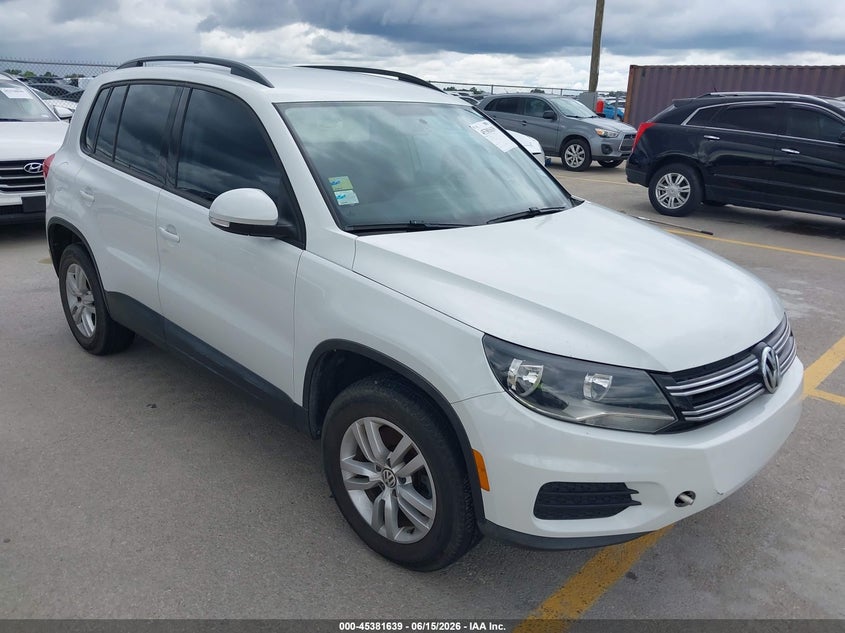 2015 Volkswagen Tiguan VIN WVGBV7AX4FW585617 IAAI salvage auction — NORMAL WEAR, Clear (Texas), sold $1,800 on 2026-07-16 (photo 1)
