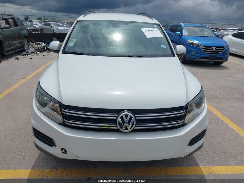 2015 Volkswagen Tiguan VIN WVGBV7AX4FW585617 IAAI salvage auction — NORMAL WEAR, Clear (Texas), sold $1,800 on 2026-07-16 (photo 6)