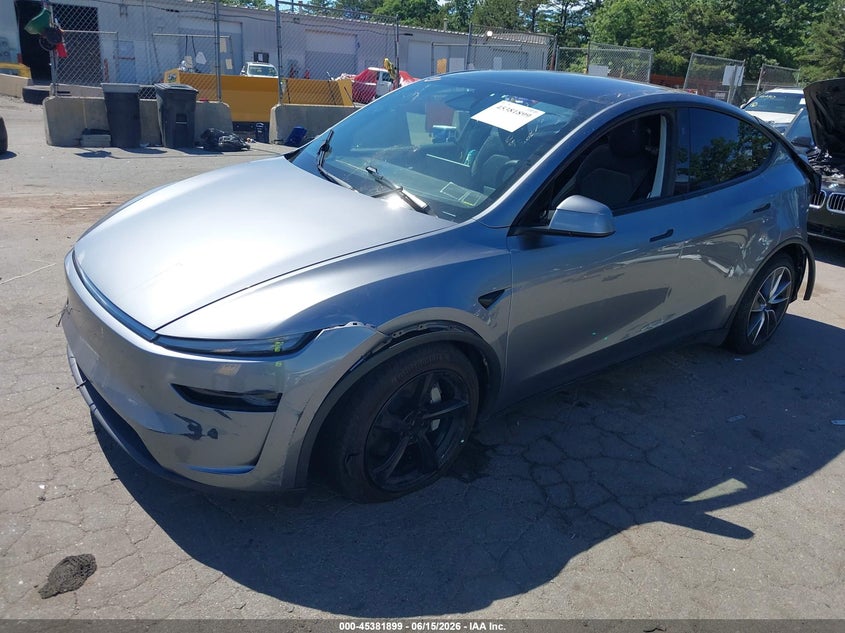 2026 Tesla Model y VIN 7SAYGDEE2TF321895 IAAI salvage auction — FRONT & REAR, Salvage Title, sold $14,600 on 2026-07-13 (photo 2)