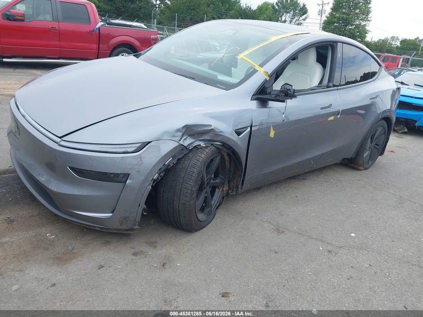 2026 Tesla Model y VIN 7SAYGDEE3TA457871 IAAI salvage auction — FRONT & REAR, Salvage (North Carolina), sold $20,500 on 2026-07-16 (photo 2)