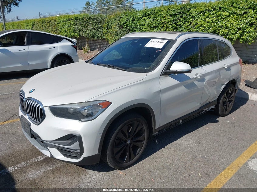2020 BMW X1 VIN WBXJG7C02L5P85457 IAAI salvage auction — LEFT SIDE, Salvage (California), sold $8,250 on 2026-07-07 (photo 2)