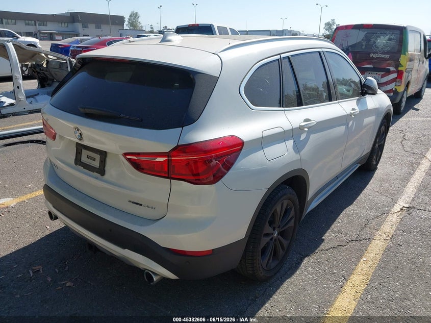 2020 BMW X1 VIN WBXJG7C02L5P85457 IAAI salvage auction — LEFT SIDE, Salvage (California), sold $8,250 on 2026-07-07 (photo 4)