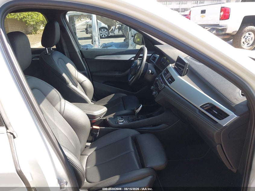 2020 BMW X1 VIN WBXJG7C02L5P85457 IAAI salvage auction — LEFT SIDE, Salvage (California), sold $8,250 on 2026-07-07 (photo 5)