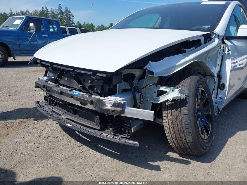 2026 Tesla Model y VIN 7SAYGDED1TA597862 IAAI salvage auction — SUSPENSION, Bill Of Sale (Washington), sold $20,200 on 2026-07-16 (photo 6)