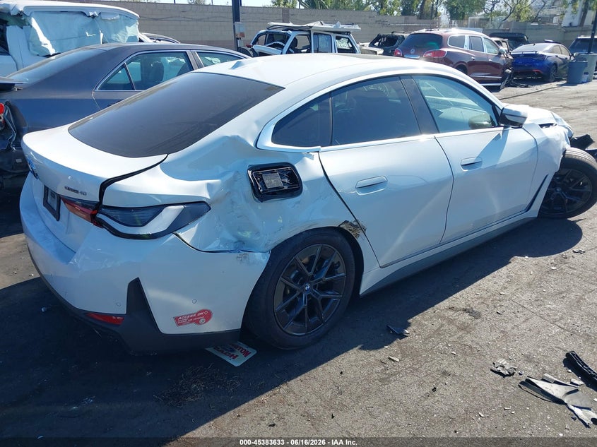 2024 BMW I4 VIN WBY73AW03RFR48601 IAAI salvage auction — SIDE, Salvage Title, sold $10,200 on 2026-07-24 (photo 4)
