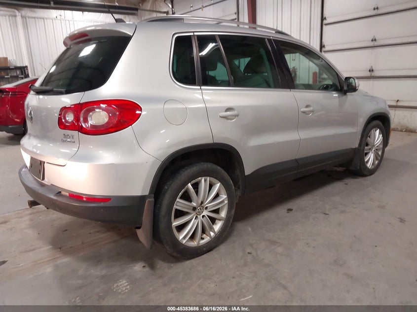 2009 Volkswagen Tiguan VIN WVGBV75N59W527271 IAAI salvage auction — HAIL, Salvage (Iowa), sold $600 on 2026-07-21 (photo 4)