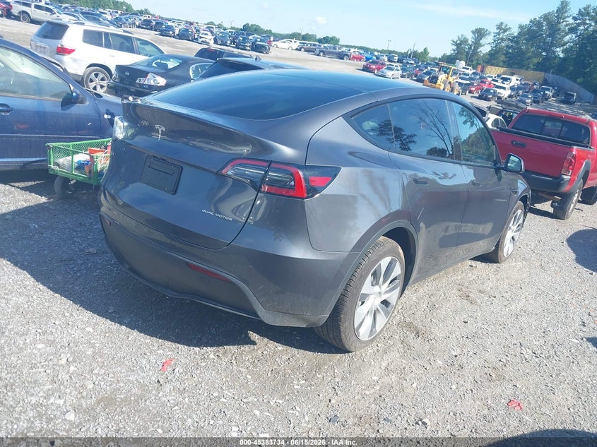 2023 Tesla Model y VIN 7SAYGDEE3PA162839 IAAI salvage auction — NORMAL WEAR, Clear (Georgia), sold $11,300 on 2026-07-16 (photo 4)