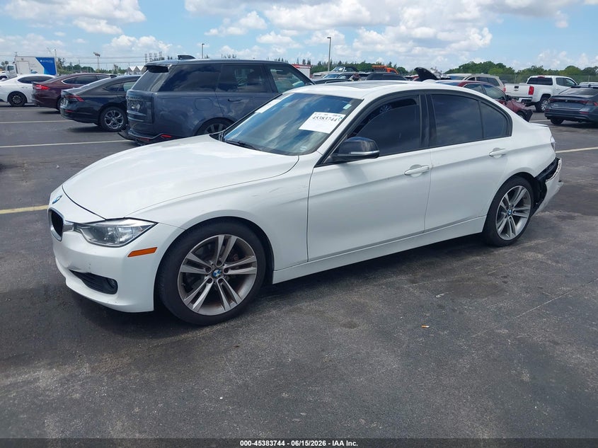 2014 BMW 3er VIN WBA3C1C57EK107105 IAAI salvage auction — LEFT REAR, Rebuildable (Florida), sold $950 on 2026-07-16 (photo 2)