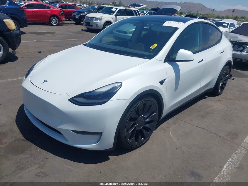 2022 Tesla Model y VIN 7SAYGDEFXNF409525 IAAI salvage auction — RIGHT SIDE, Salvage (Arizona), sold $10,400 on 2026-07-28 (photo 2)