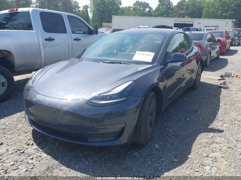 2023 Tesla Model 3 VIN 5YJ3E1EAXPF699736 IAAI salvage auction — REAR END, Salvage Title, sold $7,300 on 2026-08-01 (photo 2)