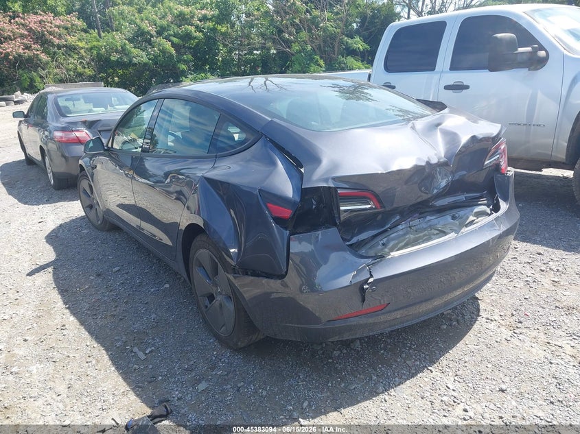2023 Tesla Model 3 VIN 5YJ3E1EAXPF699736 IAAI salvage auction — REAR END, Salvage Title, sold $7,300 on 2026-08-01 (photo 3)