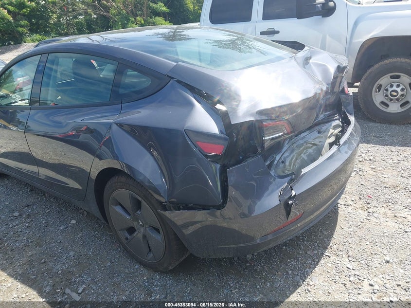 2023 Tesla Model 3 VIN 5YJ3E1EAXPF699736 IAAI salvage auction — REAR END, Salvage Title, sold $7,300 on 2026-08-01 (photo 6)