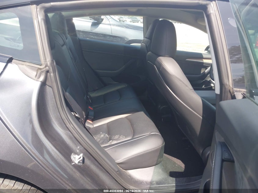 2023 Tesla Model 3 VIN 5YJ3E1EAXPF699736 IAAI salvage auction — REAR END, Salvage Title, sold $7,300 on 2026-08-01 (photo 8)
