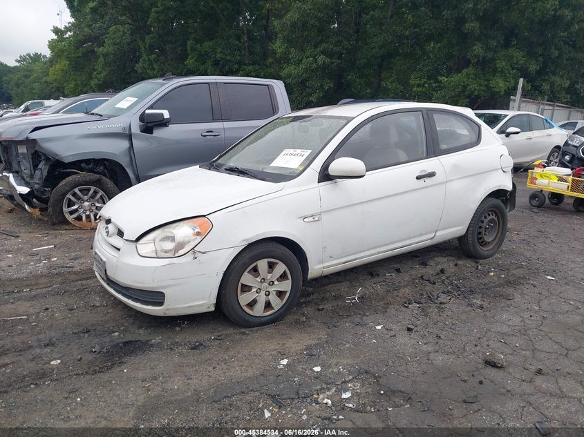 2010 Hyundai Accent VIN KMHCM3AC9AU156992 IAAI salvage auction — FRONT & REAR, Salvage (Idaho), sold $200 on 2026-07-15 (photo 2)
