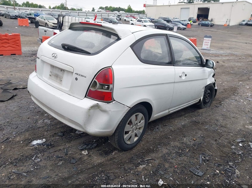 2010 Hyundai Accent VIN KMHCM3AC9AU156992 IAAI salvage auction — FRONT & REAR, Salvage (Idaho), sold $200 on 2026-07-15 (photo 4)