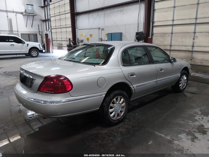 2002 Lincoln Continental VIN 1LNHM97V82Y684888 IAAI salvage auction — REAR END, Salvage (Idaho), sold $375 on 2026-07-24 (photo 4)