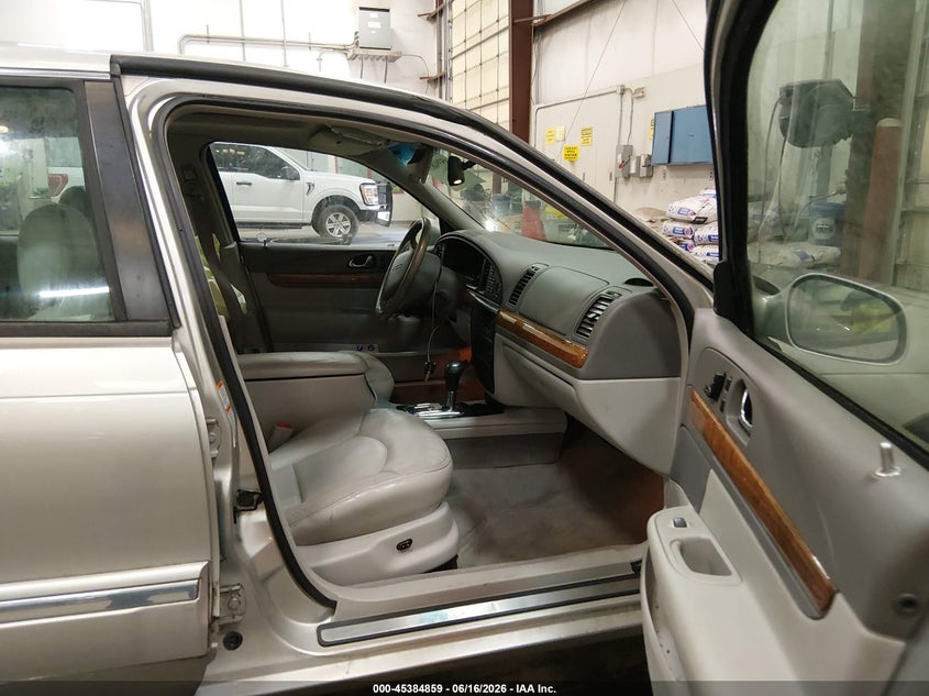 2002 Lincoln Continental VIN 1LNHM97V82Y684888 IAAI salvage auction — REAR END, Salvage (Idaho), sold $375 on 2026-07-24 (photo 5)
