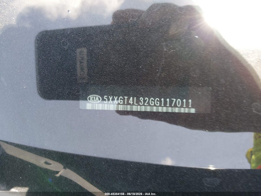 2016 Kia Optima VIN 5XXGT4L32GG117011 IAAI salvage auction — REAR END, Salvage (Texas), sold $650 on 2026-07-28 (photo 9)